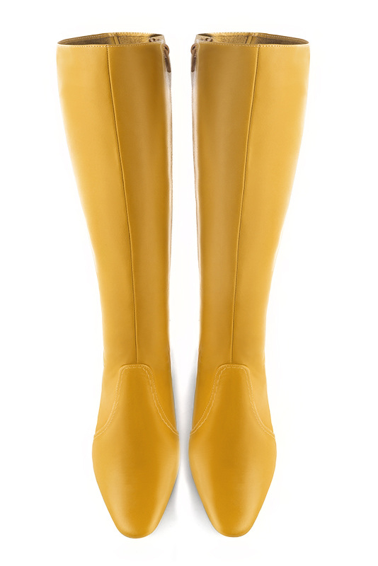 Mustard yellow feminine knee high boots. Round toe. Low flare